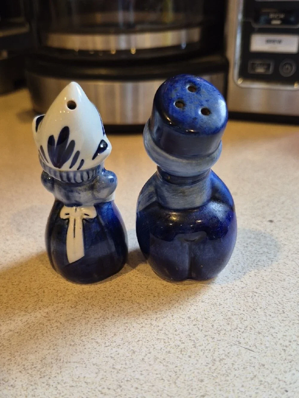 Delft Blue and White Delft-Style Porcelain Figurine Pair